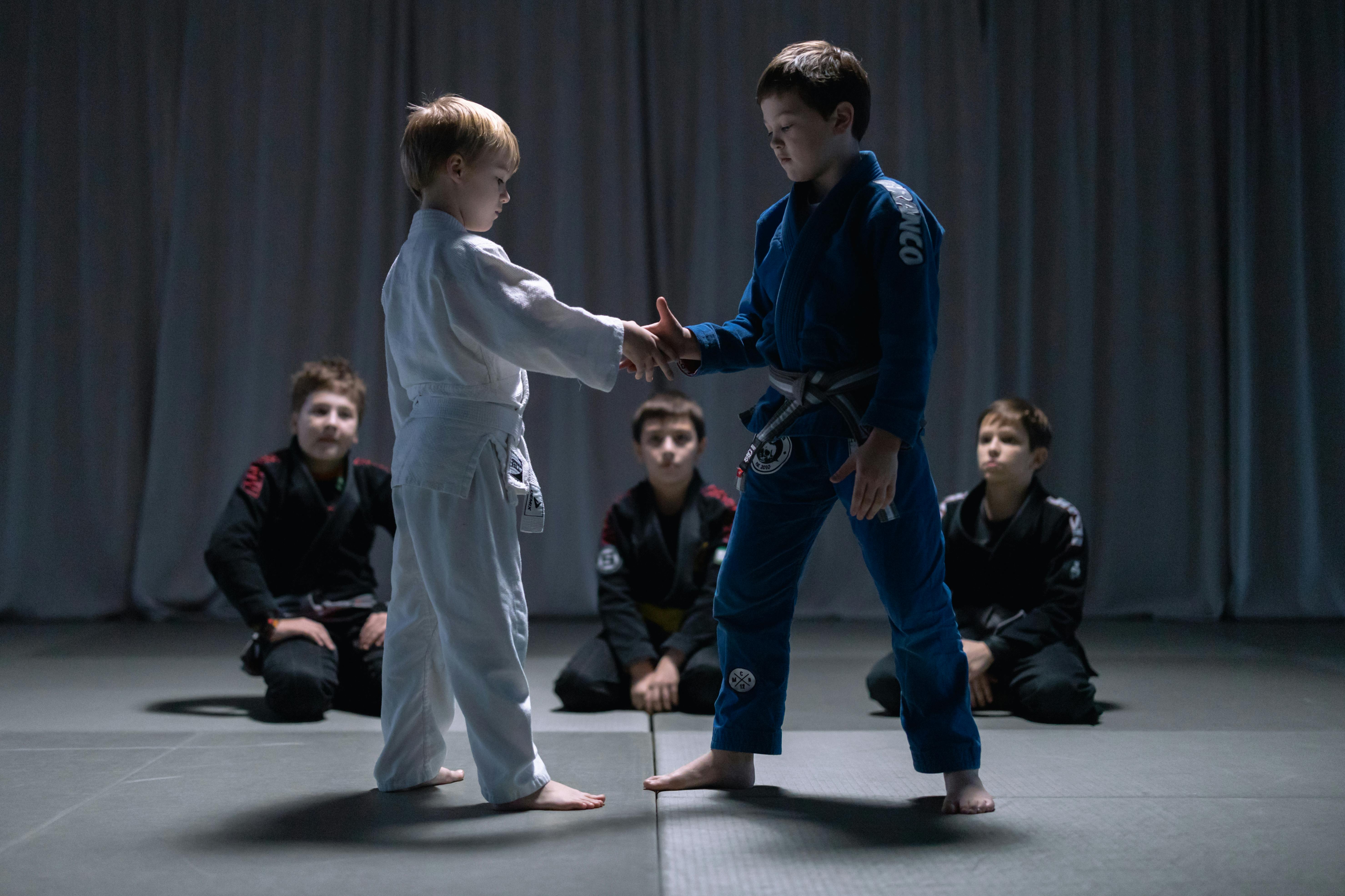 Martial arts class with students training together, illustrating community, discipline, and dojo culture at a growing martial arts academy.