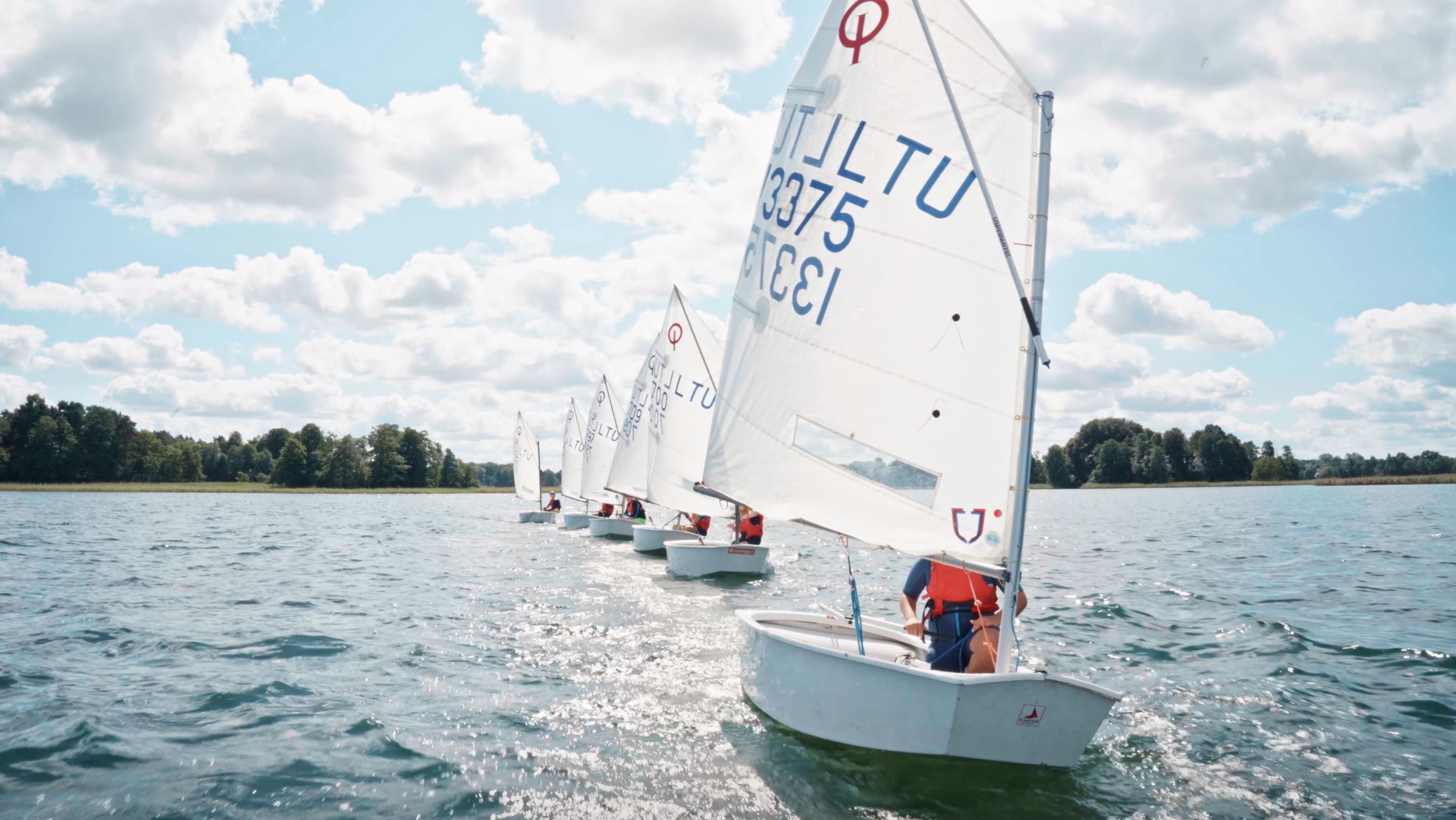 Students from Gero Vėjo Klubas sailing during training — an EXOCLASS success story showing how an after-school club management system enhances their learning experience.
